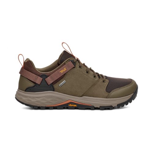 A side view of the TEVA GRANDVIEW GTX LOW RAINFOREST BROWN/DARK - MENS hiking shoe by Teva, featuring a rugged rubber sole with Vibram Megagrip and a lace-up closure.