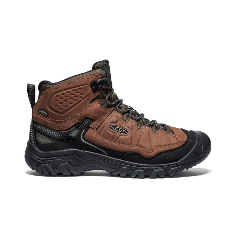 The KEEN TARGHEE IV MID WATERPROOF BISON/BLACK - MENS features a rugged sole, lace-up front, and durable design for long-lasting wear. Experience superior cushioning with every step you take on your outdoor adventures.