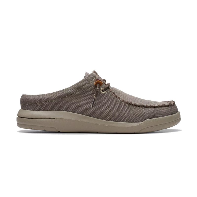 Side view of the CLARKS DRIFTLITE SURF SLIP ON MOC TOE TAUPE INTEREST - MENS by Clarks, a brown slip-on lightweight canvas shoe with a beige sole, brown leather laces, and an Extreme Comfort foam footbed.