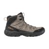 A grey OBOZ SAWTOOTH X MID ROCKFALL - MENS with black accents is shown in a side view. The boot has a rugged sole and laces, featuring the brand name "Oboz" in orange on the side. Equipped with Adaptive Cushioning Technology, it also boasts B-DRY waterproof protection for all-weather durability.