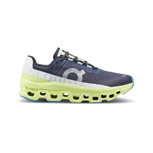 Side view of a blue and white ON CLOUDMONSTER IRON/HAY - MENS running shoe by On Running with a yellow sole, featuring a unique honeycomb design and advanced CloudTec® technology for added cushioning and performance.