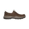 Side view of a brown leather Skechers SKECHERS SHORE THING MOC TOE LEATHER BUNGEE SLIP IN BROWN - MENS with laces, a rugged rubber sole, and Air-Cooled Memory Foam® for added comfort.