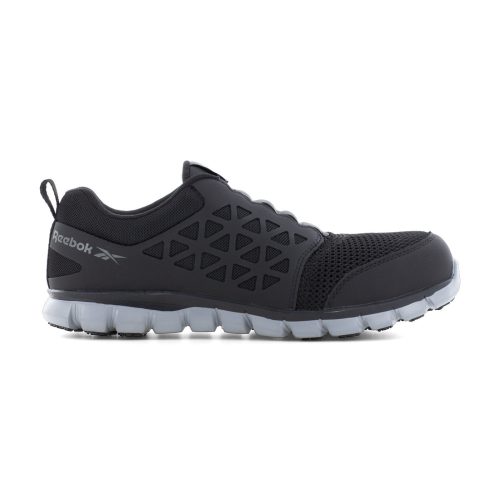 REEBOK SUBLITE COMPOSITE TOE SLIP ON WORK SHOE BLACK - MENS with a grey sole, featuring a geometric design on the side and equipped with a MemoryTech Massage footbed for unparalleled comfort by Reebok Work.