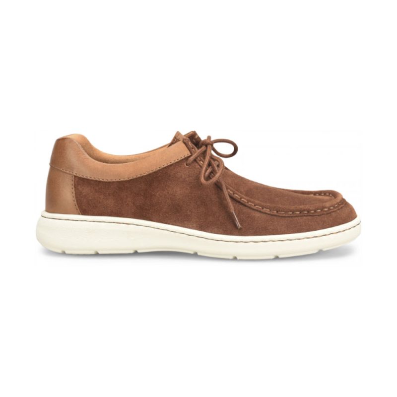 A brown suede lace-up shoe with a white rubber sole, featuring heritage chukka styling, viewed from the side. This is the BORN MAVERICK MOC TOE CHUKKA BROWN COMBO - MENS by Born.