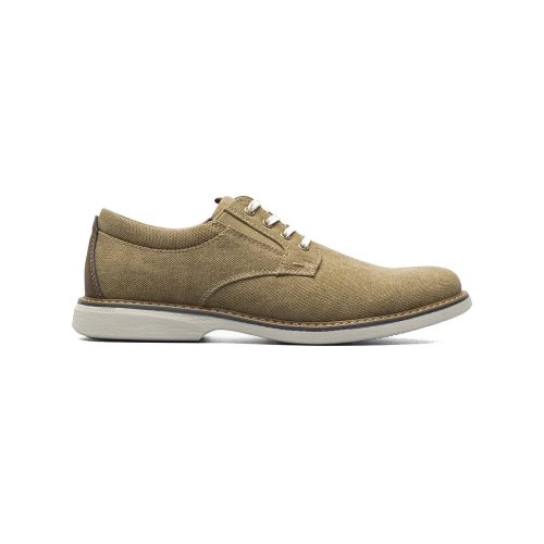 A tan-colored casual shoe, the Nunn Bush Otto Canvas Plain Toe Oxford Khaki - Mens by Nunn Bush, featuring a canvas upper with white laces on a white background. The shoe boasts a white sole and a brown accent on the heel.