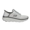 A white Skechers SKECHERS D'LUX WALKER - REZINATE GRAY KNIT/DURALE - MENS athletic sneaker with a gray "S" logo on the side, featuring a mesh upper, Air-Cooled Memory Foam cushioned sole, and lace-up design.