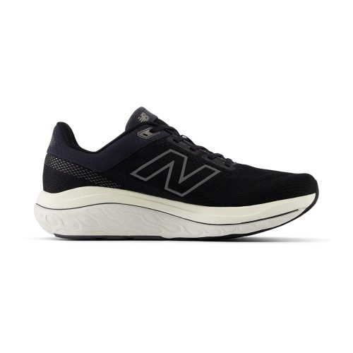 The New Balance 860V13 Black/Phantom/Sea Salt - Mens, this black athletic footwear features a white sole and the distinctive letter "N" on the side. Enhanced with Stability Plane technology, it promises optimal support for every run.